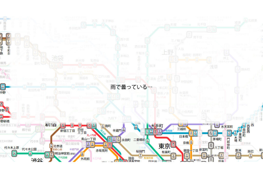 雨で曇っていた千代田線西日暮里改札の路線図